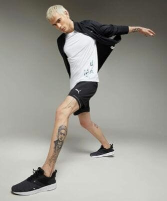 PUMA Unisex NRGY Comet Laufschuh in schwarz mit weißer sohle