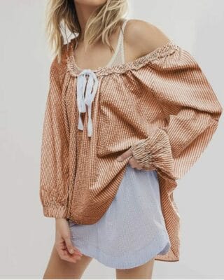 Gönne Dir dieses ausgefallene Blusenshirt und genieße die perfekte Mischung aus Stil und Komfort.