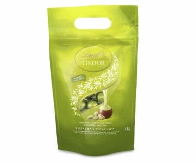 Genieße Lindt LINDOR Pistazie Pralinen Exquisite Milchschokoladenkugeln mit cremiger Füllung, im wiederverschließbaren 1 kg Beutel.