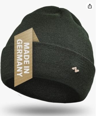 Stilvoll und warm: NYTTED® Merino Mütze, optimal für Winteraktivitäten, mit abnehmbarem Logo-Pin.