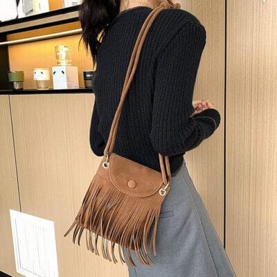 Kleine Handtasche mit Quaste